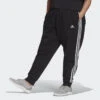 ADIDAS Essentials 3-Stripes Fleece Broek (Grote Maat) -Aanbiedingen Trend Doek Winkel essentials 3 stripes fleece broek grote maat